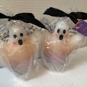 Bleeding Ghost Candles, Bleeds yellow, orange, pink, purple and black! 5.3” tall